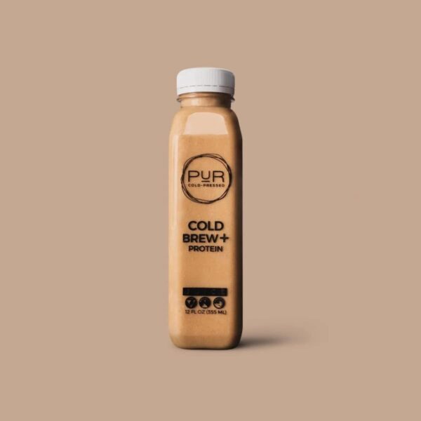 Vista lateral de botella de jugo prensado en frío PUR Harmony