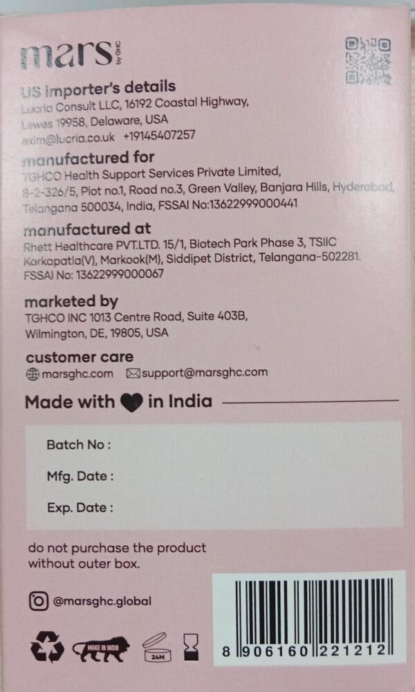 Cápsulas Mars BurnIt en mesa de madera con ingredientes