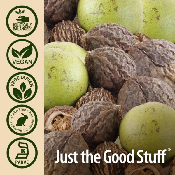 Cápsulas Nogal Negro Nature's Answer en mano para tomar